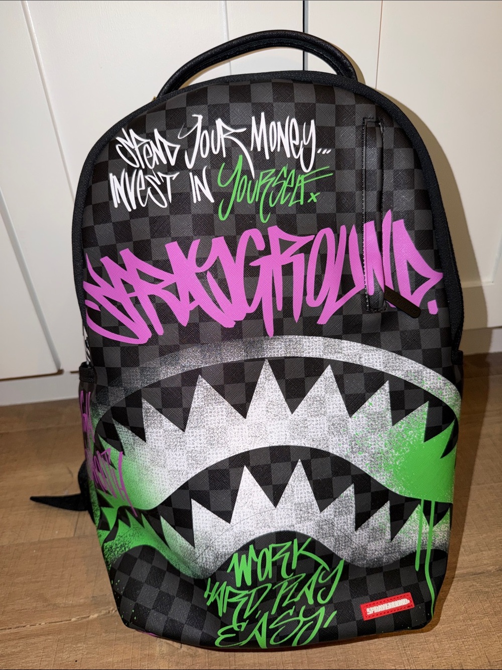 SPRAYGROUND®️Graffiti Print Black Backpack with Pink & Green Accents